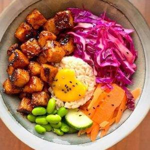 Vegan “Honey BBQ Tofu” with a sesame mango dressing