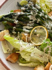 Vegan Roasted Asparagus over Caesar Salad