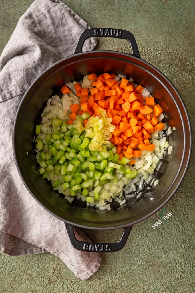 adding in the vegetables