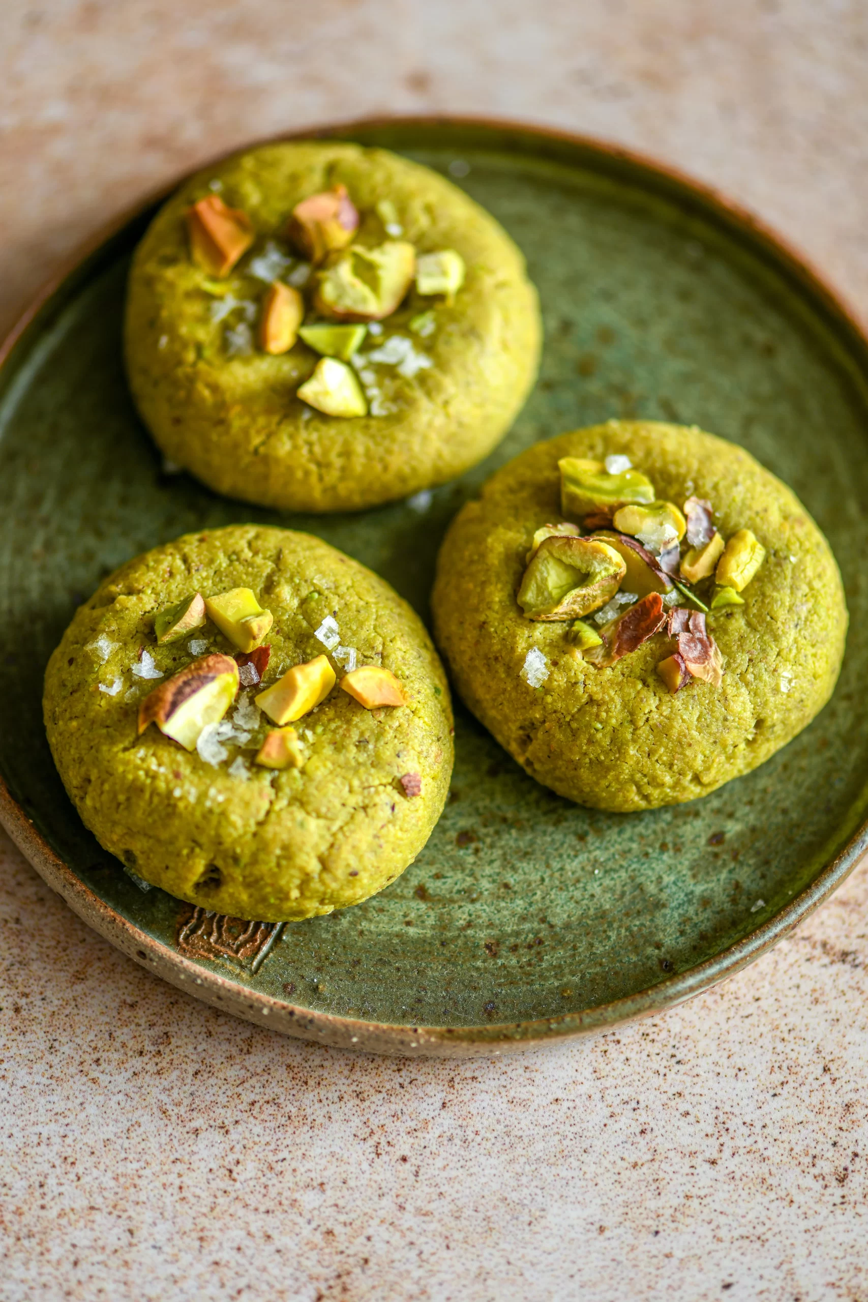 pistachio cookies on plate